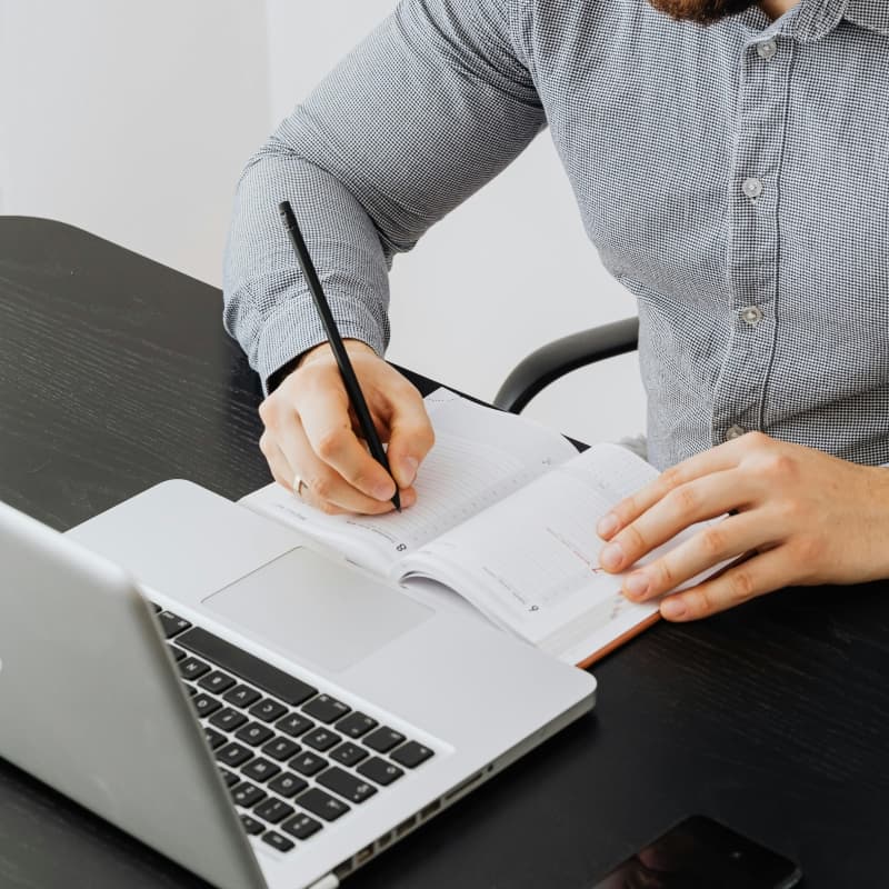 Creative workspace with coffee, laptop and desk accessories